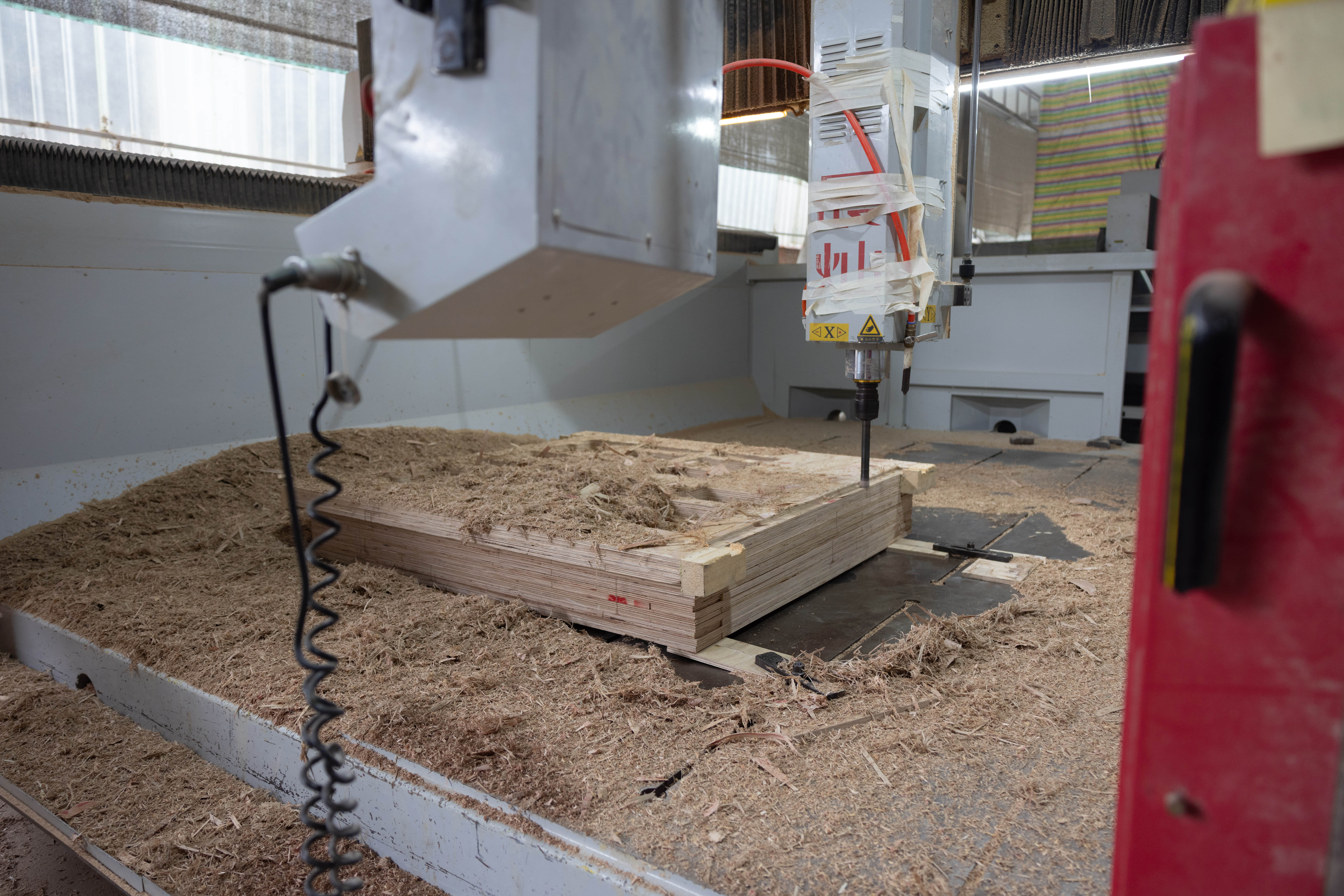 CNC machine cutting a wooden casting pattern