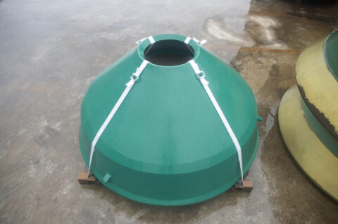 Cone crusher mantle with straps and support